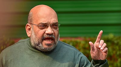 பயங்கரவாதத்தை மோடி அரசு காப்பாற்றாது: அமித் ஷா