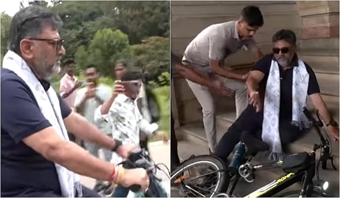 சைக்கிளில் இருந்து தவறி விழுந்த கர்நாடக துணை முதல்வர்!