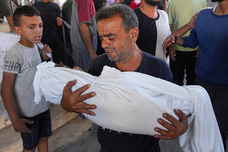 Israeli forces and drones fire on hundreds of Palestinians waiting for aid