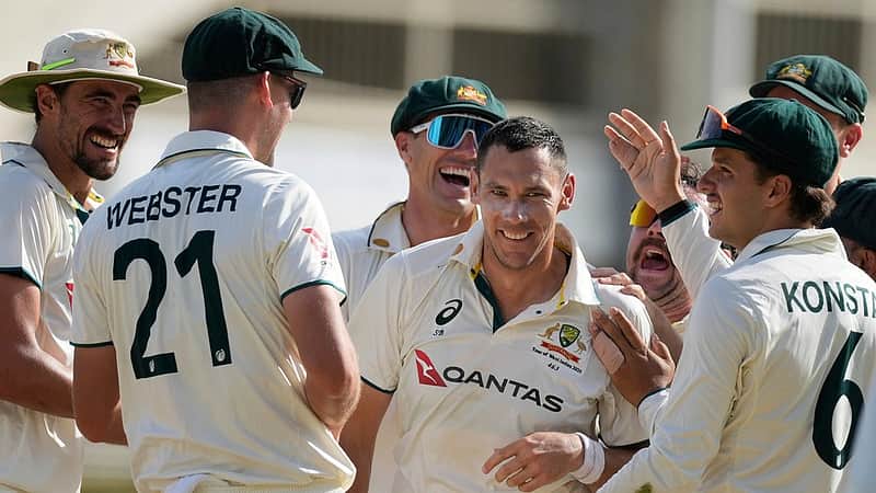Australia's Scott Boland celebrates after taking the wicket of West Indies' Jomel Warrican to complete a hat trick on day three