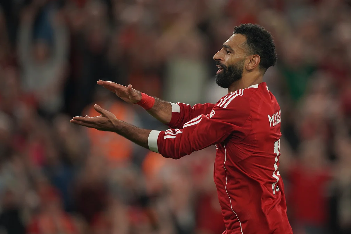 Liverpool's Mohamed Salah celebrates after scoring his side's fourth goal during the English Premier League