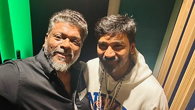 விருது வாங்கியவருடன்.. தடபுடல் விருந்துடன் இட்லி கடை!