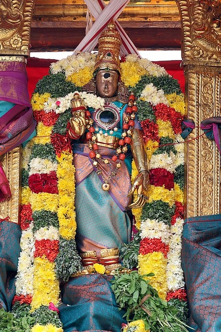 மீனாட்சி சுந்தரேசுவரா் கோயிலில் நாரைக்கு முக்தி கொடுத்த திருவிளையாடல்; திரளானோா் பங்கேற்பு
