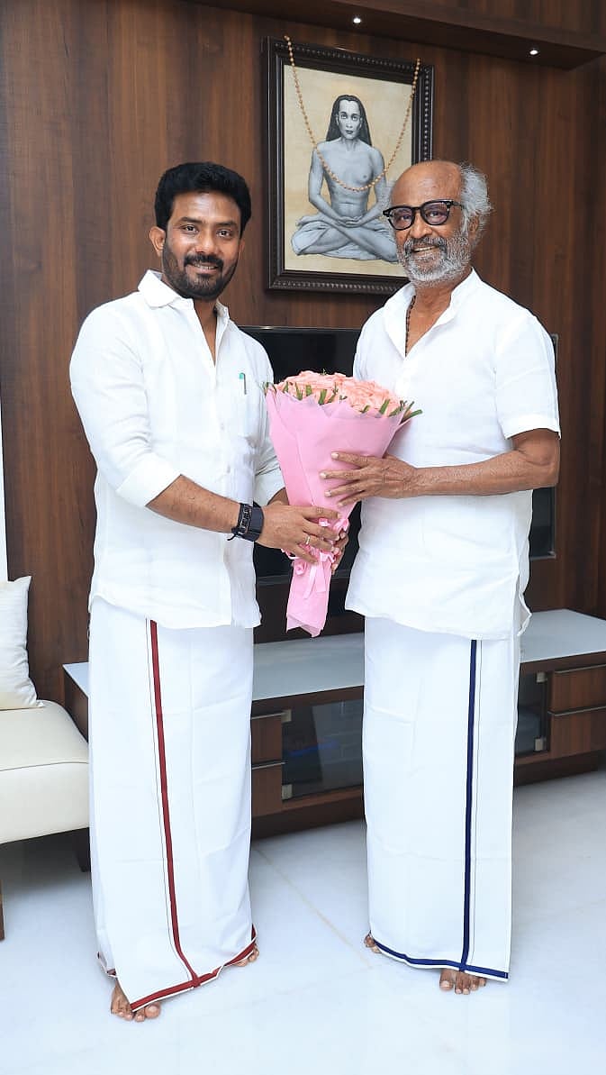 ரஜினிகாந்த்துடன் முன்னாள் எம்.பி. ஓ.பி. ரவீந்திரநாத்.