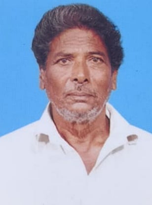 மனைவியை அடித்துக் கொன்ற கணவா் கைது