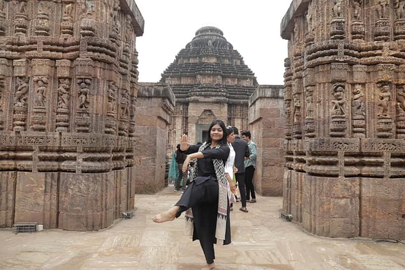 A tourist striking dance posing at the Konark temple on Wednesday -- Photo by Shamim Qureshy
