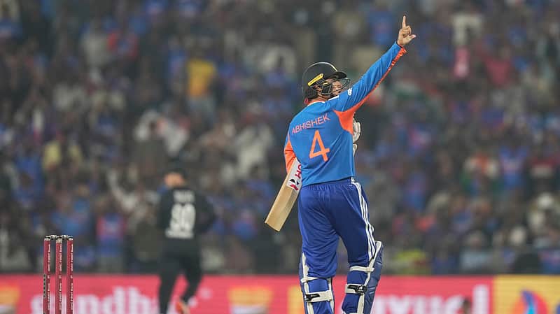India's Abhishek Sharma celebrates after scoring fifty runs during the first T20 cricket match between India and New Zealand in Nagpur, India.