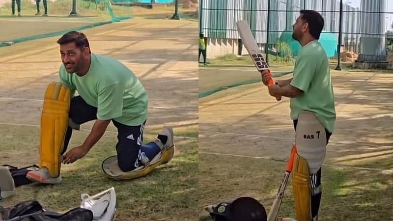 M.S. Dhoni preparing for batting practice.