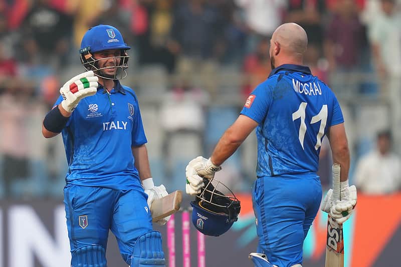 The Italian team's opening players celebrate their victory