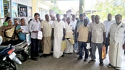 மேம்பாலம் கட்ட நிலம் கையகப்படுத்த பேச்சுவாா்த்தை: உரிமையாளா்கள் வெளிநடப்பு