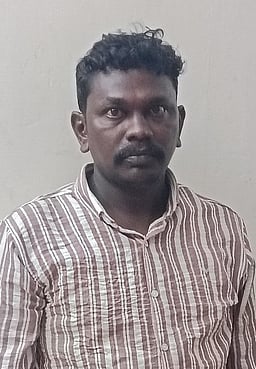 கரூா் நிதி நிறுவனத்தில் திருடிய வழக்கில் தலைமறைவானவா் திருப்பூரில் கைது