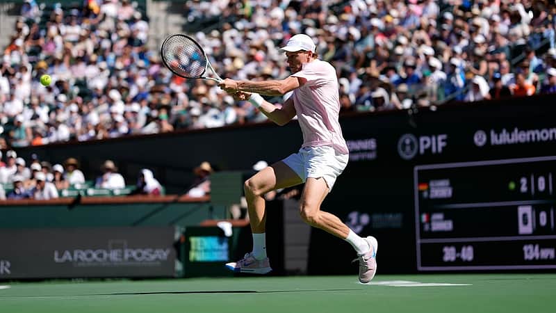 Jannik Sinner, of Italy, returns a shot against Alexander Zverev, of Germany, during a semifinal match at the BNP Paribas Open tennis tournament, Saturday, March 14, 2026, in Indian Wells, Calif. (AP Photo/Mark J. Terrill)