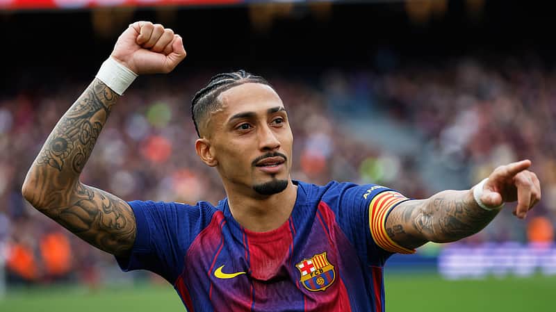Barcelona's Raphinha celebrates after scoring during the Spanish La Liga soccer match between Barcelona and Sevilla in Barcelona, Spain, Sunday, March 15, 2026. (AP Photo/Joan Monfort)