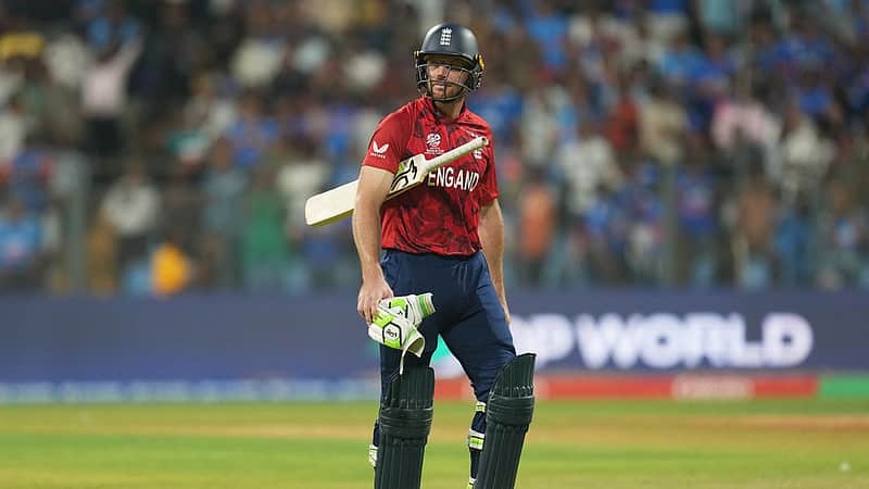 England's Jos Buttler walks off the field after losing his wicket during the T20 World Cup cricket semi-final match between India and England in Mumbai, India, Thursday, March 5, 2026. (AP Photo/Rafiq Maqbool)