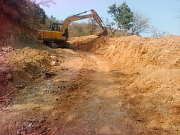 கோட்டூா் மலைக்கிராம சாலைப் பணிகள் தொடக்கம்