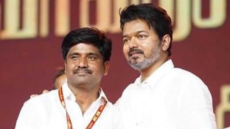 Madhiyazhagan with TVK leader Vijay.