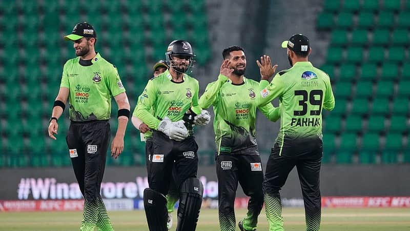 Lahore Qalandars' Sikandar Raza, second right, celebrates with teammates after taking the wicket of Hyderabad Kingsmen Marnus Labuschagne during the opening cricket match of the Pakistan Super League between Lahore Qalandars and Hyderabad Kingsmen, which taking place without spectators, in Lahore, Pakistan, Thursday, March 26, 2026. (AP Photo/K.M. Chaudary)