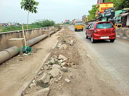 வைகை தென்கரை அணுகு 
சாலையைச் சீரமைக்க வலியுறுத்தல்