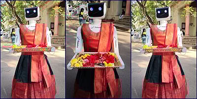 கோவை வாக்குச்சாவடியில் பாரம்பரிய உடையில் வாக்காளர்களை வரவேற்ற 'டினா' ரோபோ!