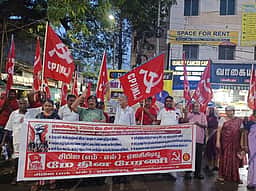நெல்லையில் தொழிற்சங்கத்தினா் பேரணி