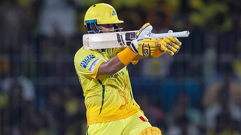 Karthik Sharma expresses his joy after smashing a half-century.