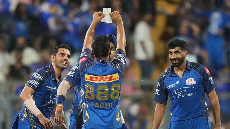 Mumbai Indian's Raghu Sharma celebrates with teammates the wicket of Lucknow Super Giants' Akshat Raghuwanshi during the Indian Premier League cricket match between Mumbai Indians and Lucknow Super Giants in Mumbai, India, Monday, May 4, 2026.(AP Photo/Rafiq Maqbool)