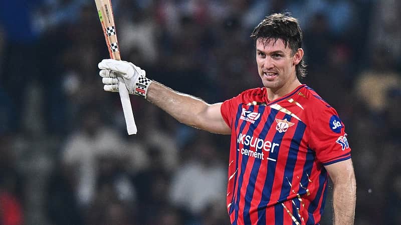 Lucknow Super Giants' Mitchell Marsh celebrates his century during the Indian Premier League cricket match between Royal Challengers Bengaluru and Lucknow Super Giants in Lucknow, India, Thursday, May 7, 2026. (AP Photo)