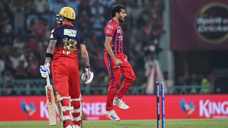 Lucknow Super Giants' Prince Yadav, right, celebrates the wicket of Royal Challengers Bengaluru's Virat Kohli, left, during the Indian Premier League cricket match between Royal Challengers Bengaluru and Lucknow Super Giants in Lucknow, India, Thursday, May 7, 2026. (AP Photo)