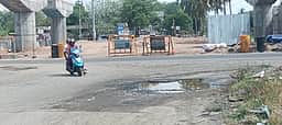 கரூா் கோடங்கிப்பட்டியில் மழையால் சேதமடைந்த சாலையை சீரமைக்கக் கோரிக்கை