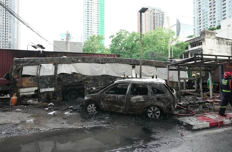 Cargo train hits public bus at Bangkok rail crossing, killing at least 8