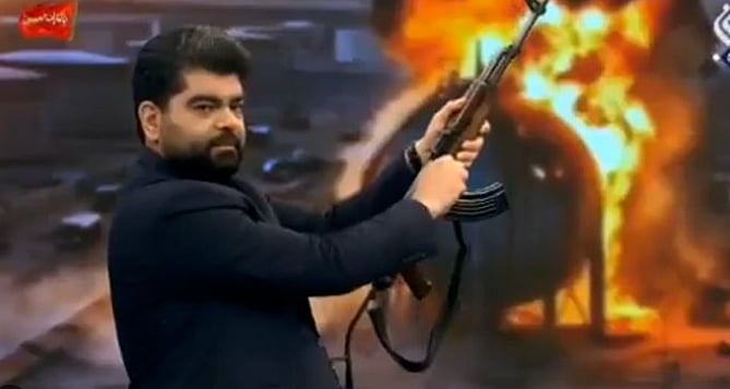 ஈரான் டிவி நிகழ்ச்சியில் துப்பாக்கி சுடும் பயிற்சி!