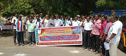 கரூரில் டாஸ்மாக் அனைத்து தொழிற்சங்கத்தினா் ஆா்ப்பாட்டம்