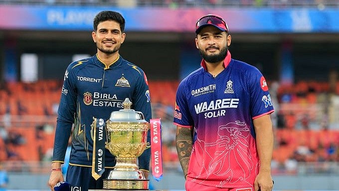 Gujarat Titans Captain Shubman Gill and Rajasthan Royals Captain Riyan Parag with the IPL trophy.