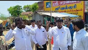 திருவாடானை பேருந்து நிலையத்தில் வெள்ளிக்கிழமை ஆய்வு மேற்கொண்ட அமைச்சா் வி.கே. ராஜீவ். உடன் வட்டார வளா்ச்சி அலுவலா் பாலதண்டாயுதம் உள்ளிட்டோா்.