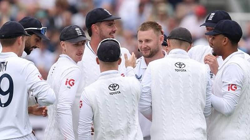 England players rejoicing after taking a wicket.