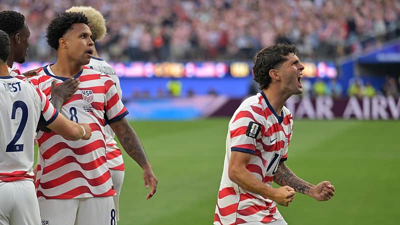 United States' Christian Pulisic, right, celebrates with teammates after an own goal by Paraguay's Damian Bobadilla during the World Cup Group D soccer match in Inglewood, Calif., near Los Angeles, Friday, June 12, 2026. (AP Photo/Jayne Kamin-Oncea)