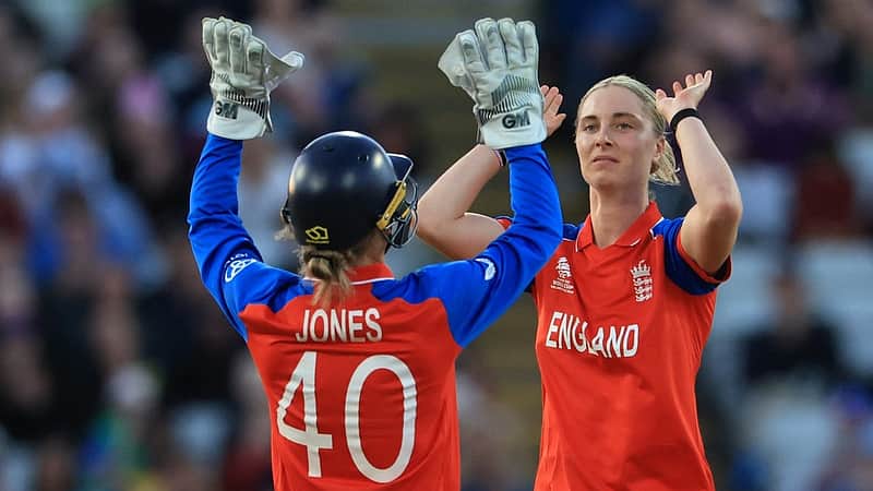 England's Freya Kemp (R) celebrates taking the wicket of Sri Lanka's Harshitha Samarawickrama on the first day of the ICC Women's T20 cricket World Cup 2026 Group 2 stage cricket match between England and Sri Lanka at Edgbaston cricket ground in Birmingham, central England on June 12, 2026. (Photo by Darren Staples / AFP)