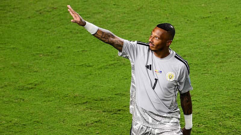 Curacao goalkeeper Eloy Room (1) waves to fans after the World Cup Group E soccer match between Ecuador and Curacao in Kansas City, Mo., Saturday, June 20, 2026. (AP Photo/Reed Hoffmann)