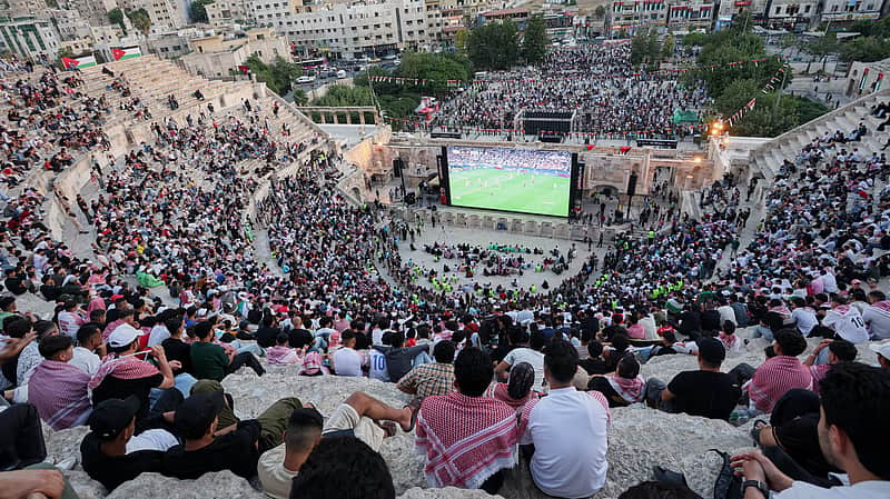 Jordanian soccer fans watch the FIFA World Cup Group J match between Jordan and Argentina on a large screen at the Roman Amphitheater in downtown Amman, Jordan, early Sunday, June 28, 2026. (AP Photo/Raad Adayleh)
