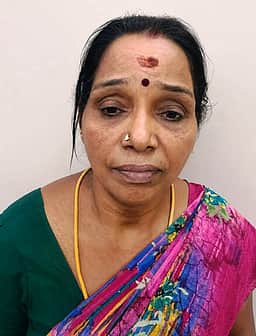 புட்லூா் கோயிலில் பெண்ணிடம் நகை திருட்டு: மற்றொரு பெண் கைது
