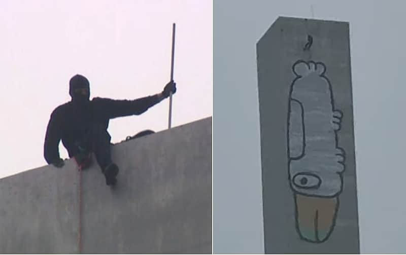 Melbourne bridge graffiti vandal arrested after seven-hour police standoff