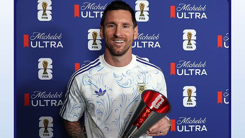 Messi with the Man of the Match award.