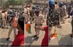 சிஜேபி போராட்டத்தில் தேசியக் கொடியை அவமதித்த காவலர்!