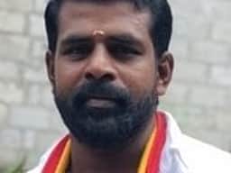 பள்ளி ஊழியா் தற்கொலை வழக்கு: தொழிலாளி கைது