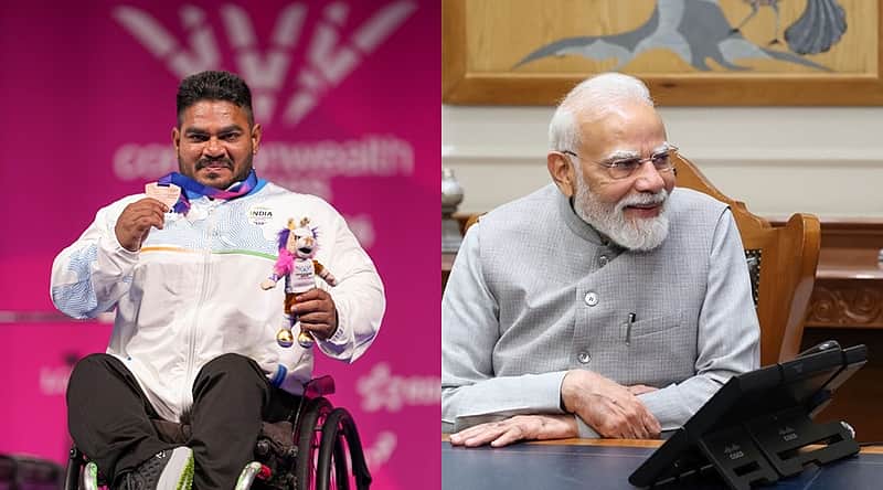 Bronze medalist Jhandu Kumarand Prime Minister Modi.