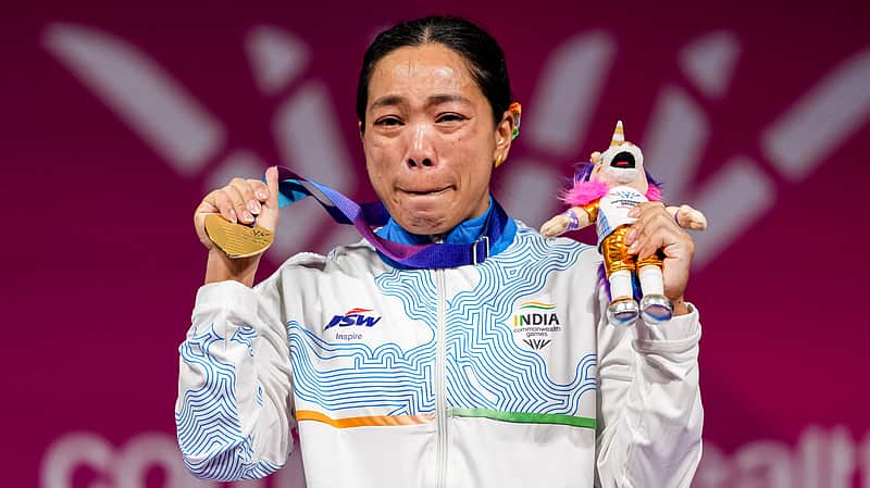 Mirabai Chanu sheds tears of joy after winning the gold medal.