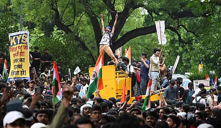 <P>Cockroach Janata Party (CJP) supporters raise slogans as they gather ahead of a protest march, at the Jantar Mantar, in New Delhi, early Monday, Ju