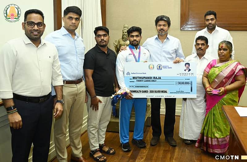 While handing over the cheque to Raja Muthupandi