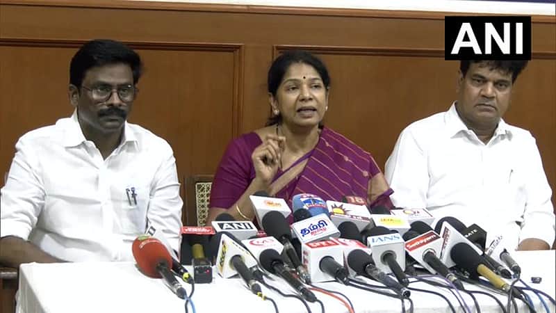 Kanimozhi and DMK functionaries with the MP.