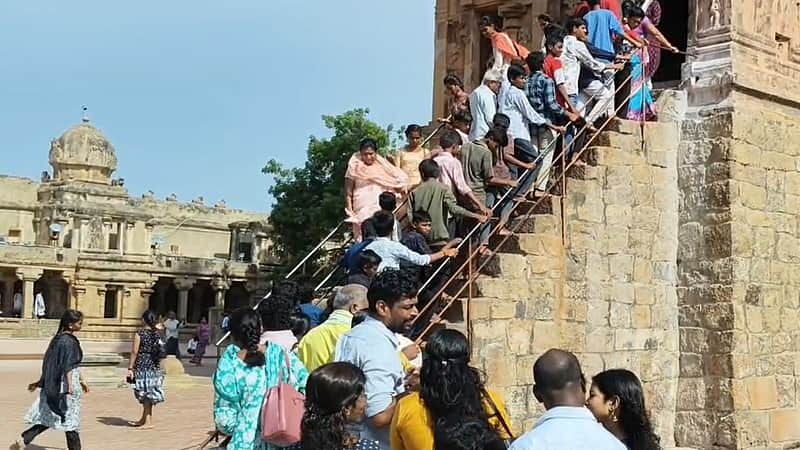 Devotees waiting in line at the Thanjavur Big Temple.